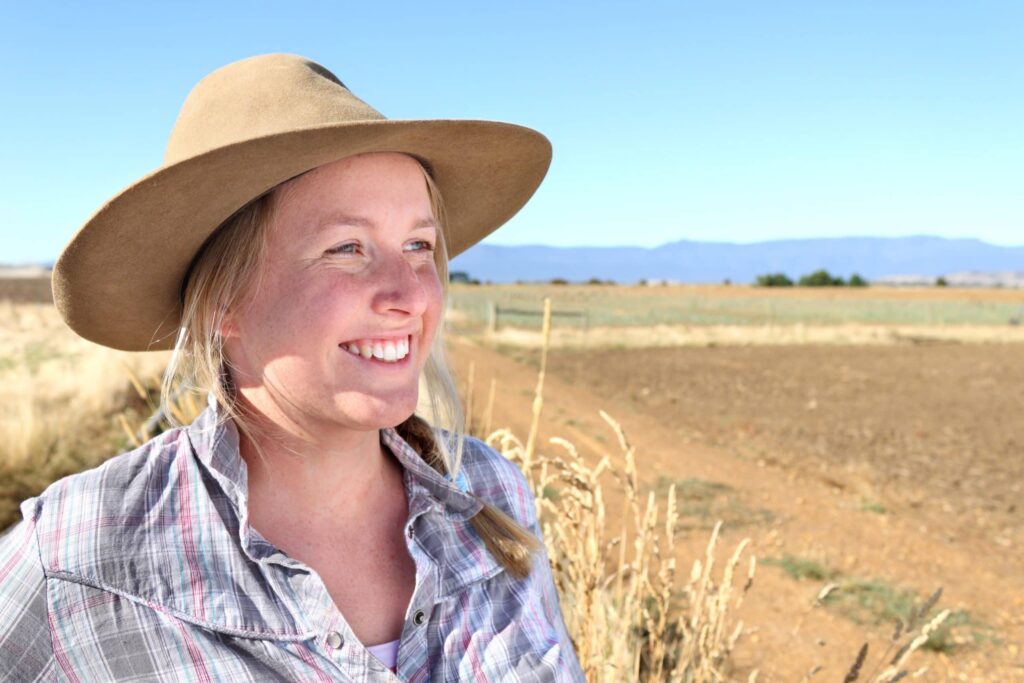 Bumper grain harvest australian farmer smiling