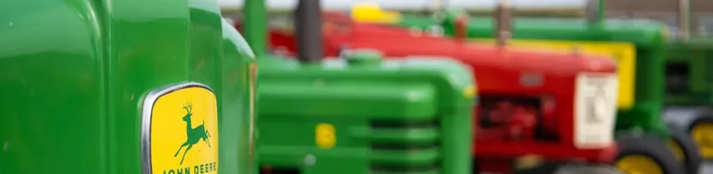 John Deere Logo Tractors Lined Up